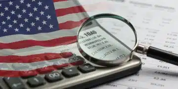 Calculator with US flag and magnifying glass over financial documents for 2026 IRS tax changes